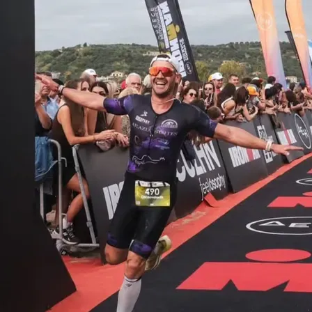 Valantis finishing a long-distance triathlon