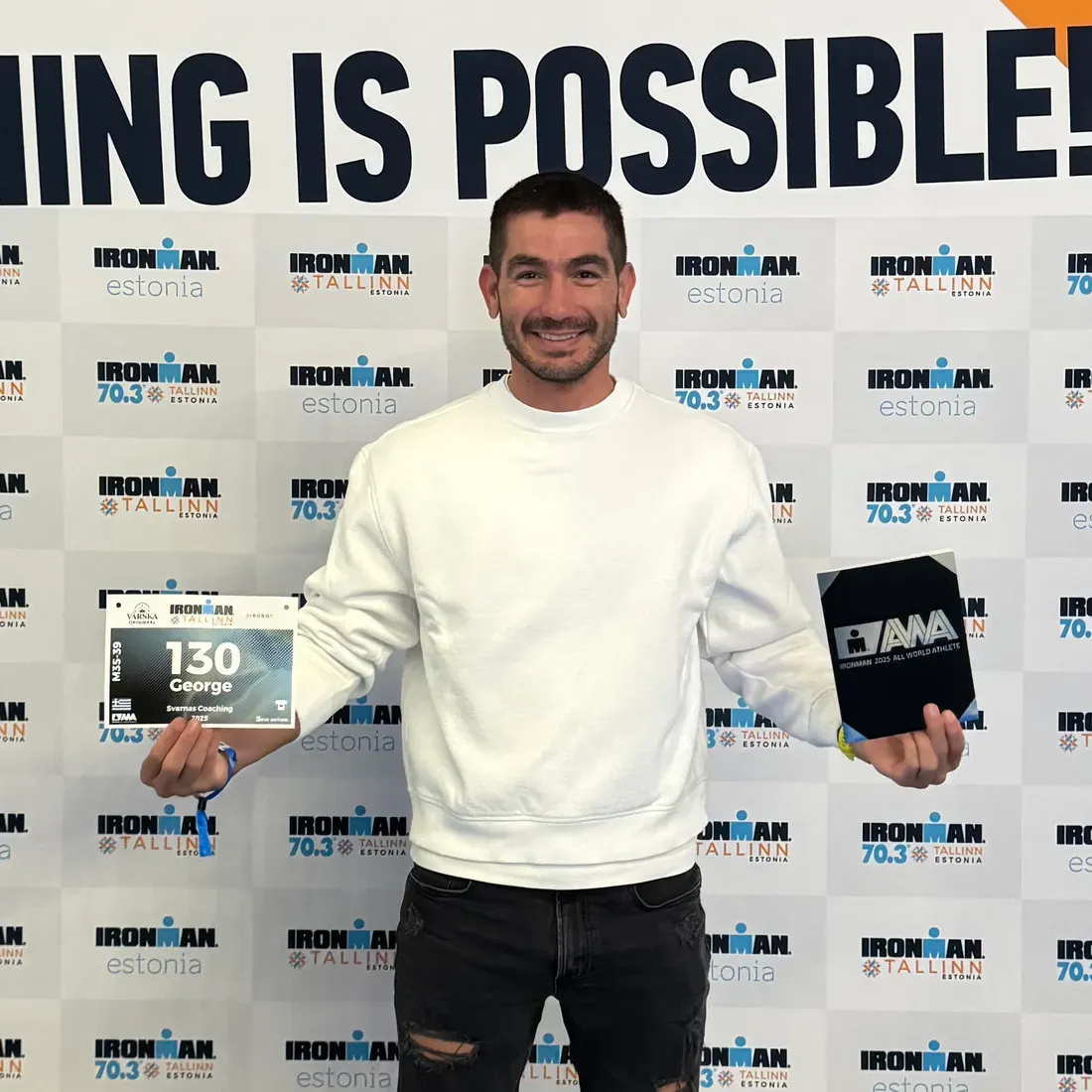 George Svarnas with his All World Athlete award at IRONMAN Tallinn